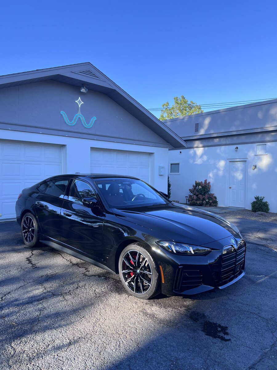 Black Audi sedan with 3-5 year ceramic coating - showroom shine